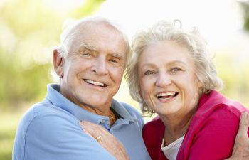 smiling elderly couple